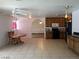 Bright living area boasts tile floors, lots of light, and a dining area at 3917 Acapulco Ave, Las Vegas, NV 89121