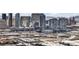 Dense cityscape featuring modern high-rise buildings, commercial and residential areas at 4381 W Flamingo Rd # 3712, Las Vegas, NV 89103