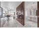 Modern condo layout with sleek design connecting the kitchen, living area, and bathroom at 4381 W Flamingo Rd # 3712, Las Vegas, NV 89103