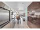Compact kitchen with stainless steel appliances and sleek design adjacent to the living area at 4381 W Flamingo Rd # 3712, Las Vegas, NV 89103