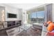 Modern living space with large window view, comfortable sofa and contemporary design at 4381 W Flamingo Rd # 3712, Las Vegas, NV 89103