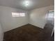 This cozy bedroom features neutral carpeting, a window for natural light, and fresh neutral paint at 5129 Sugarfoot Ave, Las Vegas, NV 89107