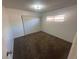 This cozy bedroom features neutral carpeting, a window for natural light, and closet space at 5129 Sugarfoot Ave, Las Vegas, NV 89107