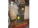 Image of a home heating HVAC system with exhaust pipe and energy guide label at 5129 Sugarfoot Ave, Las Vegas, NV 89107