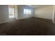 Bright living room features fresh paint, new carpet, and lots of natural light at 5129 Sugarfoot Ave, Las Vegas, NV 89107