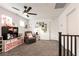Comfortable bonus room with reading chair, storage, and good natural light at 6130 Sinks Canyon Ave, Las Vegas, NV 89130