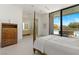 An open bedroom concept features an ensuite bathroom and outdoor access at 63 Midnight Sky Dr, Las Vegas, NV 89135