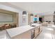 Elegant kitchen with a marble island, pendant lighting, and stainless steel appliances at 63 Midnight Sky Dr, Las Vegas, NV 89135