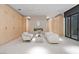 This relaxing lounge area boasts custom cabinetry and a modern fireplace, perfect for cozy gatherings at 63 Midnight Sky Dr, Las Vegas, NV 89135