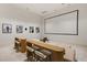 Home theater with a large projection screen and comfortable seating at 63 Midnight Sky Dr, Las Vegas, NV 89135