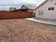 Spacious backyard area with room for customization and a concrete patio extension at 6608 Elk Creek Ln, Las Vegas, NV 89156