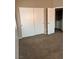 Bedroom with carpet and double closets near laundry at 6608 Elk Creek Ln, Las Vegas, NV 89156