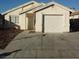 Charming single-story home with a well-maintained front yard and a one-car attached garage at 6608 Elk Creek Ln, Las Vegas, NV 89156