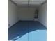 Clean, well-maintained garage with painted floor and utility connections at 6608 Elk Creek Ln, Las Vegas, NV 89156