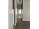 Hallway providing access to the various rooms of the home, seamlessly connecting the living spaces at 6608 Elk Creek Ln, Las Vegas, NV 89156