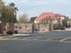 A view of the community gate showcasing a paved road at 6615 Montezuma Castle Ln, North Las Vegas, NV 89084