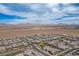 High-altitude shot showcasing a neighborhood surrounded by desert landscape and distant mountain views at 6630 Windy Palm St, North Las Vegas, NV 89086