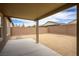 Flat backyard features a patio, gravel, and a privacy wall at 6630 Windy Palm St, North Las Vegas, NV 89086
