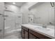Elegant bathroom showcasing a modern vanity and a glass-enclosed shower at 6630 Windy Palm St, North Las Vegas, NV 89086