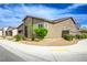 Attractive one-story home featuring desert landscaping and a corner lot on a bright, sunny day at 6630 Windy Palm St, North Las Vegas, NV 89086