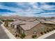 Charming single-story home featuring desert landscaping, neutral stucco, and a well-maintained tile roof at 6630 Windy Palm St, North Las Vegas, NV 89086