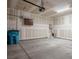 Spacious two-car garage with concrete floor and overhead lighting at 6630 Windy Palm St, North Las Vegas, NV 89086