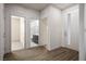 Entryway with wood floors leading to other rooms at 6630 Windy Palm St, North Las Vegas, NV 89086