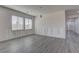 Bright living room features durable flooring and plenty of natural light at 6630 Windy Palm St, North Las Vegas, NV 89086