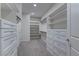 Bright walk-in closet offers ample shelving and drawer space for storage at 6630 Windy Palm St, North Las Vegas, NV 89086