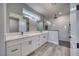 Bathroom features double sinks, sleek cabinets, and modern shower at 6631 S Parkwood Ct, Pahrump, NV 89061