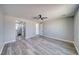 Spacious main bedroom includes access to the bathroom and modern ceiling fan at 6631 S Parkwood Ct, Pahrump, NV 89061