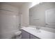 Clean, well-lit bathroom with a combined shower and tub at 6925 Cuddy Falls Pl, North Las Vegas, NV 89084