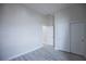 Bedroom featuring modern flooring and closet access at 6925 Cuddy Falls Pl, North Las Vegas, NV 89084