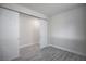 Bright room featuring modern flooring and a large closet at 6925 Cuddy Falls Pl, North Las Vegas, NV 89084