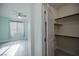 View into a walk-in closet with shelves at 6925 Cuddy Falls Pl, North Las Vegas, NV 89084