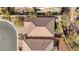 Top-down aerial view of home showing a desert landscape backyard with artificial turf at 7148 Stanley Frederick St, Las Vegas, NV 89166