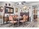 Charming dining room showcasing antique furniture, decorative items, and stylish interior design at 7148 Stanley Frederick St, Las Vegas, NV 89166