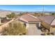 Front exterior showcasing a well-manicured lawn and a brick driveway at 7148 Stanley Frederick St, Las Vegas, NV 89166