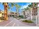 Picturesque community area featuring a water feature, manicured greenery, seating and desert landscaping at 7155 S Durango Dr # 303, Las Vegas, NV 89113