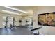 Weight room with free weights, squat rack, and bench at 7155 S Durango Dr # 303, Las Vegas, NV 89113
