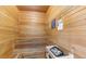 Cozy wooden sauna room with bench seating and heater at 7155 S Durango Dr # 303, Las Vegas, NV 89113