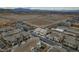 Panoramic aerial view of a developing community showcasing new homes, desert landscapes, and mountain vistas at 752 Echelon St, Las Vegas, NV 89138