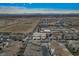 Bird's eye view of a growing community with modern homes, roads, and picturesque mountain backdrop at 752 Echelon St, Las Vegas, NV 89138