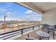 Relaxing balcony with seating offers expansive views of the city and surrounding landscape at 752 Echelon St, Las Vegas, NV 89138