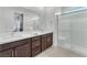 Bright bathroom with double sinks, sleek vanity, and a modern glass shower enclosure at 752 Echelon St, Las Vegas, NV 89138