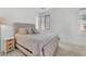 Cozy bedroom with neutral tones, soft lighting, and comfortable bedding for relaxation at 752 Echelon St, Las Vegas, NV 89138