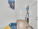 Bright foyer with wood floors, high ceilings and modern decor with a teal accent wall at 752 Echelon St, Las Vegas, NV 89138