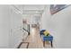 Bright foyer with wood floors, stairwell with iron handrails and decoratively appointed bench seating at 752 Echelon St, Las Vegas, NV 89138