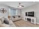 Comfortable living room features cozy seating, fireplace, and neutral tones at 752 Echelon St, Las Vegas, NV 89138