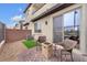 Cozy outdoor patio space featuring seating area and modern brick design at 752 Echelon St, Las Vegas, NV 89138
